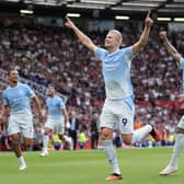 Erling Haaland celebrates after scoring the winner