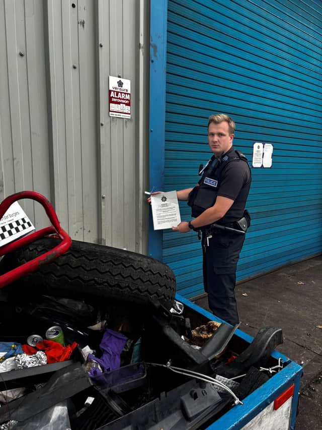 PC Dan Arthur with the closure notice.