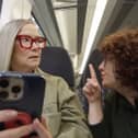 The new video shows librarians reminding noisy passengers to turn the volume down. Photo: West Midlands Railway