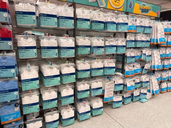 Shelves of school polos