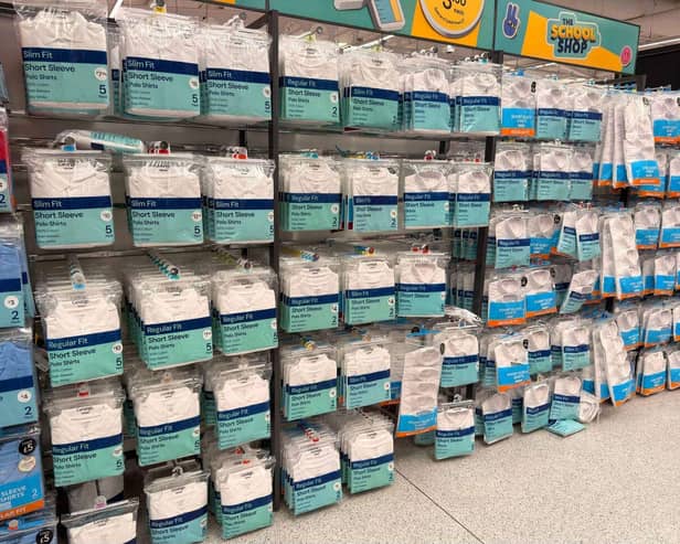 Shelves of school polos