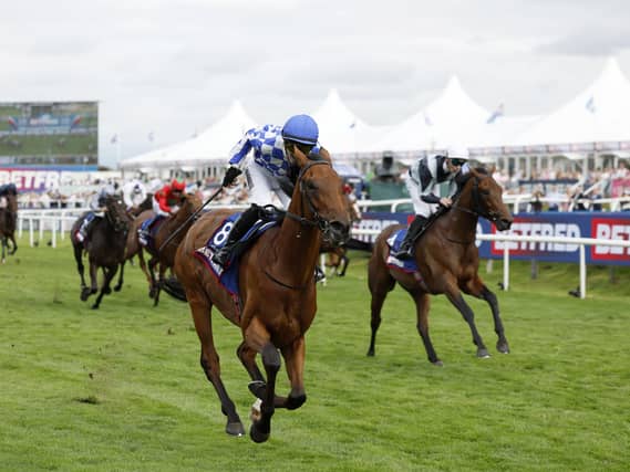 Highwayman beats Enceladus, right, in the St Leger