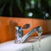 A tap running water into a bath