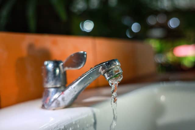 A tap running water into a bath