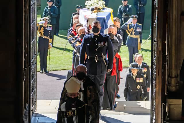 Pallbearers carry the coffin into the chapel (Danny Lawson/PA)
