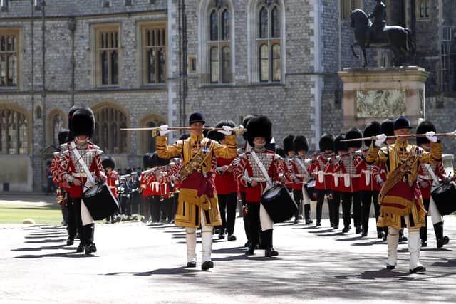 The Foot Guards Band march ahead of the funeral of the Duke of Edinburgh at Windsor Castle (Alastair Grant/PA)