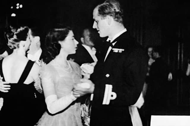 Princess Elizabeth dancing with her fiance, Lieutenant Philip Mountbatten (PA)