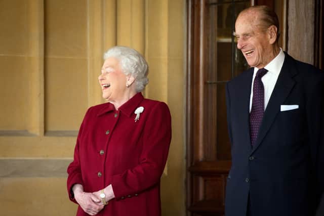 The Queen and Philip react as they bid farewell to Irish President Michael D Higgins and his wife Sabina at Windsor Castle (Leon Neal/PA)