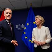 Canadian Prime Minister Mark Carney left, and European Commission President Ursula von der Leyen