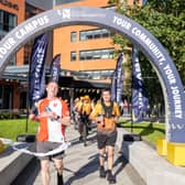 Shaun McEntee crossing the finishing line on Day One