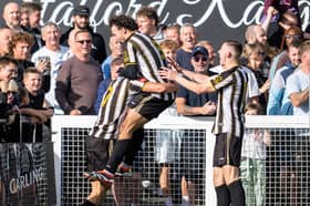 Scott Bakkor celebrates his opening goal for Stafford Rangers against Hereford Picture: Jim Wall