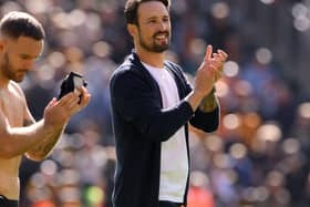 Wolves manager Cesar Peixoto applauds the fans after victory over West Brom