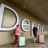 Passengers at departures at Belfast International Airport