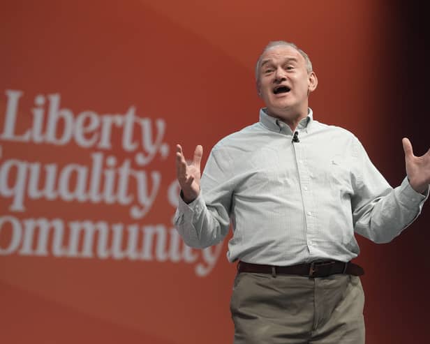 Sir Ed Davey gestures with his hands while speaking at a rally at the Lib Dem party conference