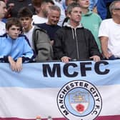 Noel Gallagher in the stands at a match