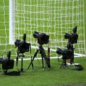 Remote cameras positioned behind the goal