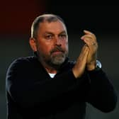 Salford City manager Peter Cklamovski applauds on the touchline