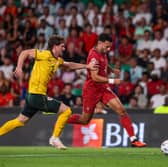 Albion's Chris Mepham tries to get to grips with Goncalo Ramos in Lisbon.