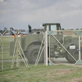 A military vehicle blocks an access gate at RAF Fairford