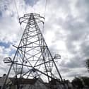 General view of power lines and lattice towers