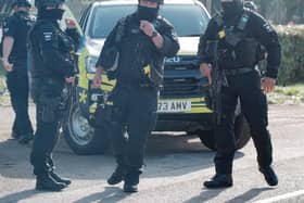 Armed police at one of the gates of RAF Fairford