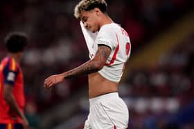 Nico O’Reilly wipes his face with his shirt