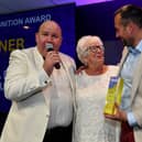 Black Country Heroes Awards at Molineux Stadium.
Special Recognition Award winner Sylvia Enefer with Express & Star editor in chief Martin Wright, right, and host Dicky Dodd, left
Tim Thursfield/Iconic Media Group

