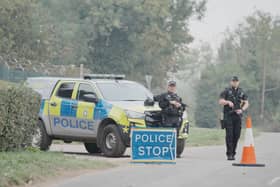 Armed police at a checkpoint near RAF Fairford in Gloucestershire