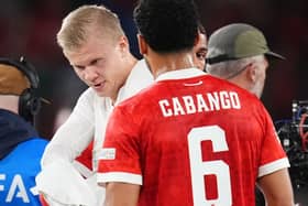 Erling Haaland gives his shirt to Ben Cabango at the end of the Wales v Norway Nations League tie