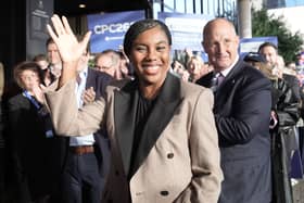 Kemi Badenoch waving