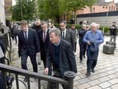 Breandan Mac Cionnaith (Brendan McKenna) (front) of the Garvaghy Road Residents’ Coalition arrives at Laganside Courts in Belfast