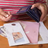 Pensioner saving money for bills