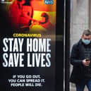 Coronavirus signage reading 'Stay home, save lives'