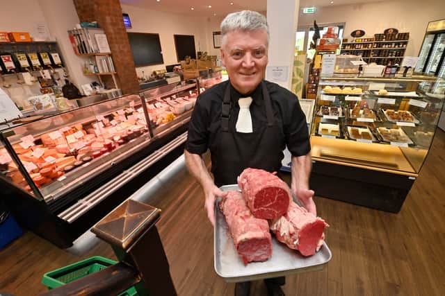 Butcher Reg Phillips in the farm shop at Halfpenny Green Wine Estate