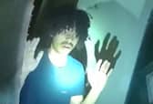 Mikey Large arrested by armed officers.