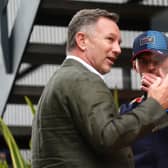 Max Verstappen (right) speaks with Christian Horner at Silverstone in July 2024