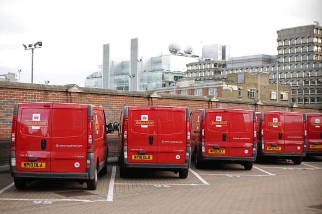 A row of Royal Mail delivery vans