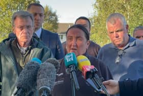 Linda O'Neill (centre) from the Garvaghy Road Residents Coalition speaking to media