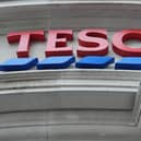 General view of a Tesco sign on the exterior of a store