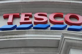 General view of a Tesco sign on the exterior of a store