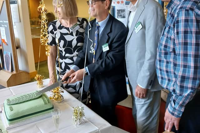 Archaeologist Graham Worton, second right, is joined by Elaine Bouckley, John Chapple and Paul Floyd of Friends of Wren’s Nest National Nature Reserve, to cut the cake to mark the 70th anniversary