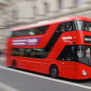 General view of a red London bus, in central London