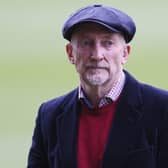 Swindon manager Ian Holloway arrives for a game