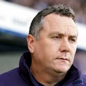 Micky Mellon looks on