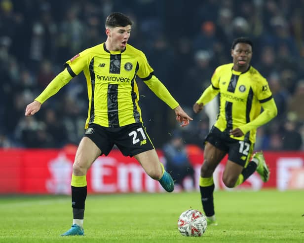 Ellis Taylor, left, playing for Harrogate