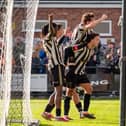 Stafford Rangers celebrate scoring during their win over Mossley 