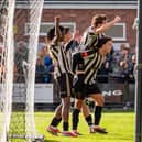 Stafford Rangers celebrate scoring during their win over Mossley 