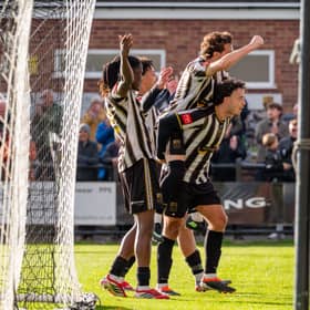 Stafford Rangers celebrate scoring during their win over Mossley 
