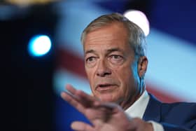 Nigel Farage answers questions at a press conference