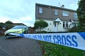 Cheslyn Hay, and alongside Littlewood Road, Police sit, as a murder enquiry takes place.